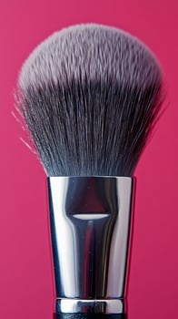 of a Luxurious Makeup Brush Soft Bristles, Chrome Handle, and Pink Background. Perfect for Beauty and Fashion Professionals, this photo
