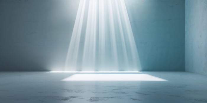 Light beams illuminate an empty space with a smooth surface in a minimalist setting during daylight hours photo