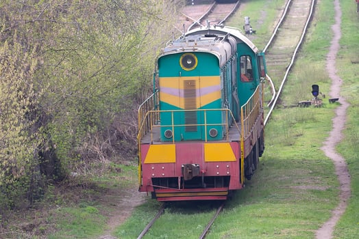 Electric shunting train during maneuvers at the railway station, shunting locomotive with electric transmission photo