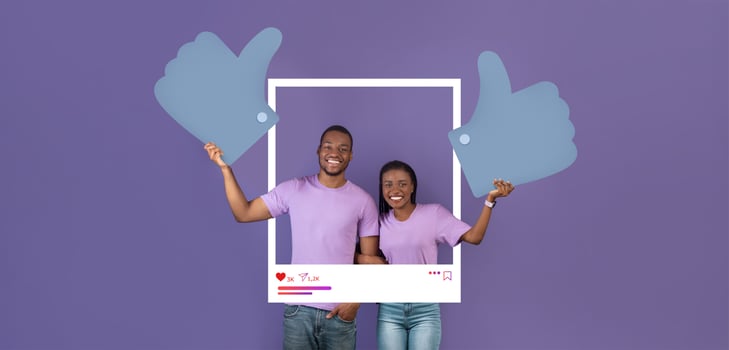 Two cheerful influencers pose with oversized thumbs up signs against a purple background, celebrating their success in creating engaging online content for their followers. photo
