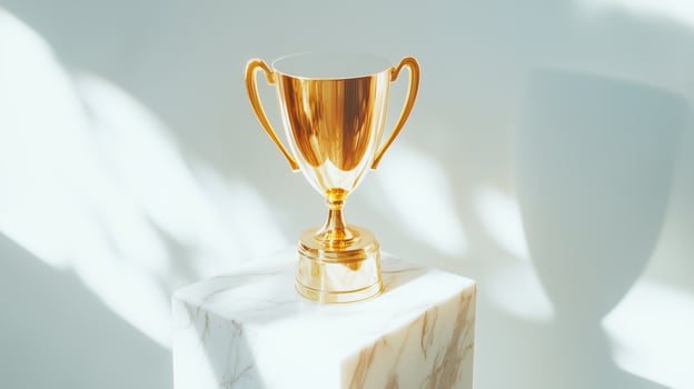 golden trophy with a sleek, polished finish photo