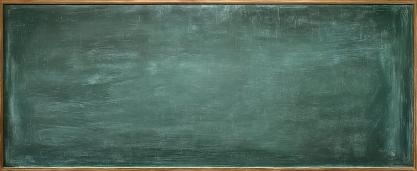 The empty chalkboard waiting for creative expression and educational insights. photo