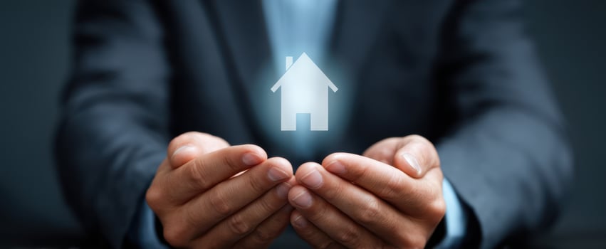 The Hands Holding a Digital Representation of a House for Homeownership Concept photo