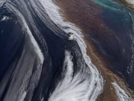 High-Altitude Satellite View of Peninsula and Clouds photo