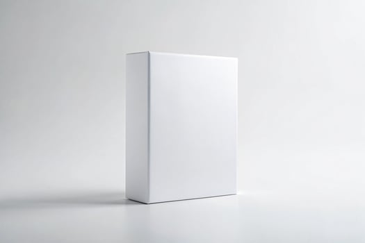 Blank white software box standing upright on a white surface with a light gray background - Minimalist Packaging Concept photo