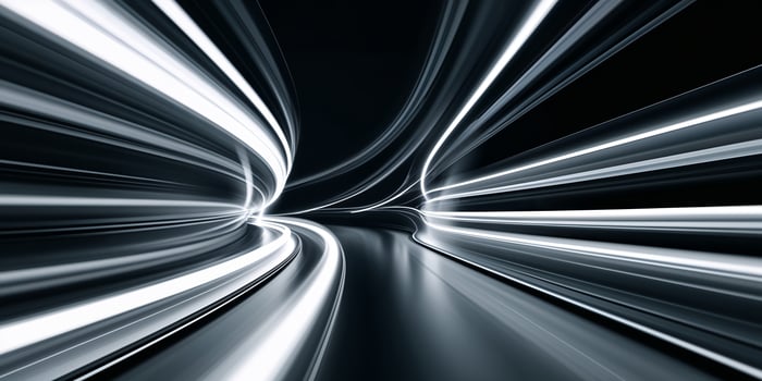 Motion blur of lights creating dynamic patterns on a dark highway during nighttime travel photo