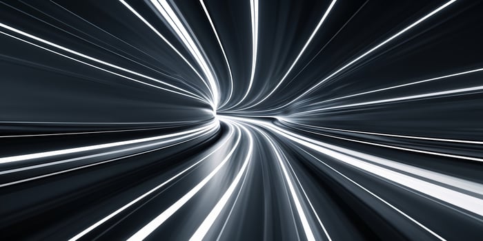 Abstract depiction of light trails in a tunnel highlighting motion and speed in a futuristic setting photo
