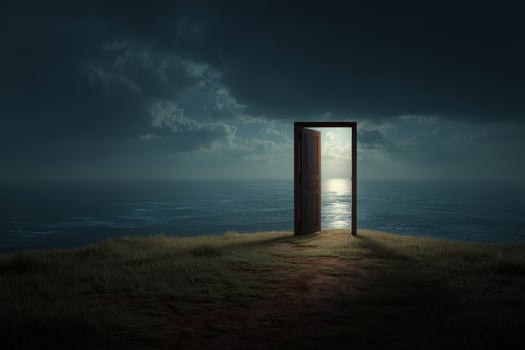 An open door stands on a grassy field under a cloudy, dark sky, revealing a serene ocean view with sunlight shining on the water. Light streams through the doorway, casting shadows photo