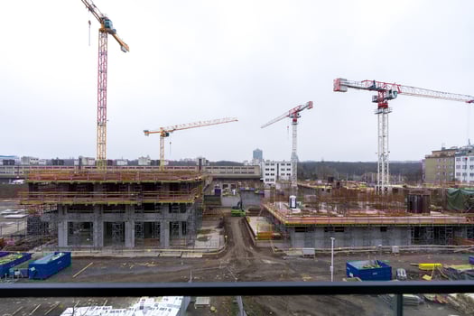 Prague, Czech republic - December 1, 2024. Construction site with cranes and buildings in Zizkov photo
