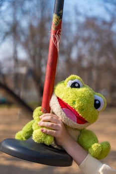 Prague, Czech republic - March 8, 2025. Smiling green plush frog toy Ferda from Emusaci photo