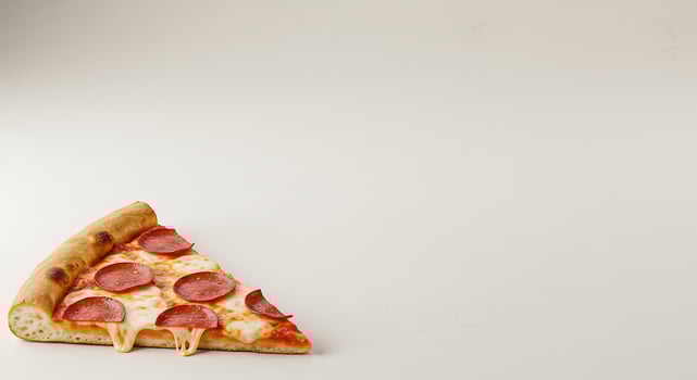 A slice of pizza on a white surface photo
