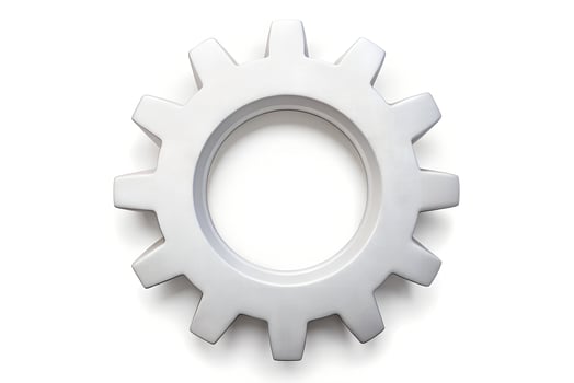 Close up of a white mechanical gear icon representing engineering technology and innovation themes photo