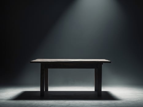 Rustic Wooden Table in a Spotlit, Dark Room, Dramatic Lighting and Shadow Play. photo