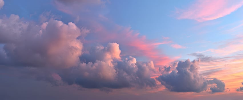The Majestic Beauty of Colorful Clouds at Sunset in a Vast Sky photo