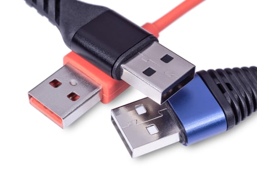 Usb connectors on white surface closeup photo