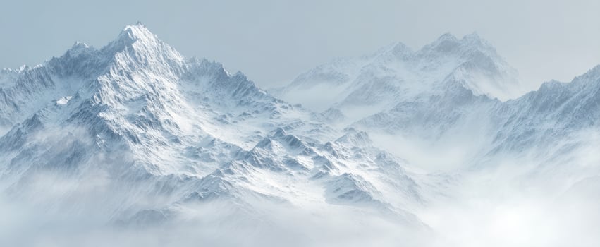 The Majestic Snow-Capped Mountains Surrounded by Mist and Serenity photo