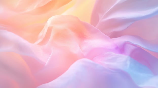 Soft pastel fabric waves creating an ethereal texture in gentle light photo