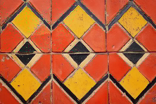 Colored tiles with geometric patterns on a wall photo