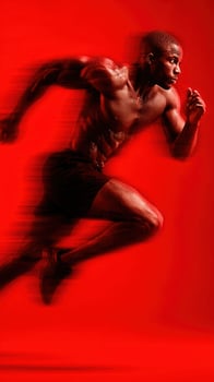 Dynamic sprint of an athletic man in a powerful running pose against a bold red background photo