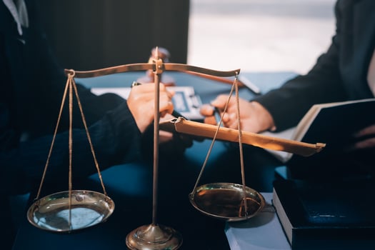 Business people discussing the law of the scales photo