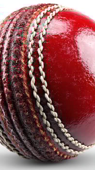 Close view of a red cricket ball showcasing its intricate stitching and texture with focus on details photo