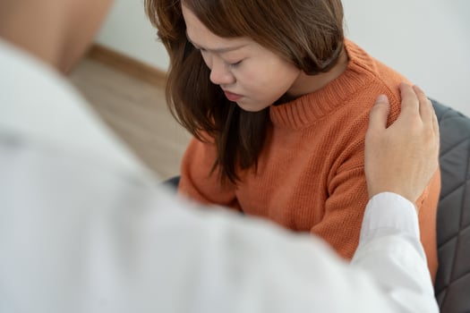 psychiatrist holds shoulders while discussing life and family issues. doctor encourages and empathy woman suffers depression. psychological, save divorce, Hand in hand together, care photo