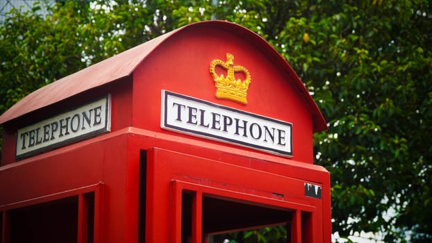 Red Telephone Booth with Crown Sign photo