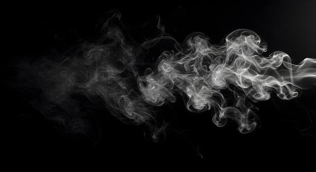 Ethereal smoke patterns dance in darkness, a captivating abstract composition photo