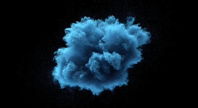 Dramatic cyan powder explosion against black backdrop for artistic expression photo