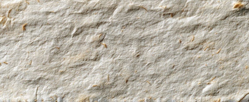 The textured background of handmade paper with natural fibers and unique patterns. photo
