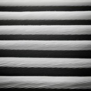 A black and white photo of a row of black and white stripes