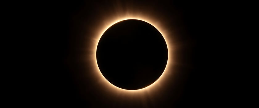 solar eclipse is seen in the dark sky photo