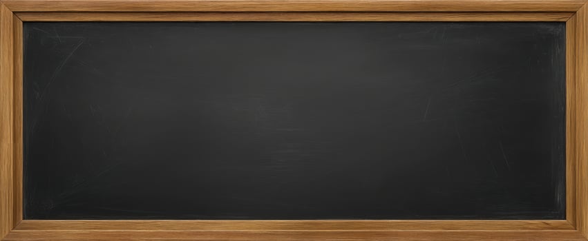 The classic wooden-framed blackboard for engaging classroom discussions and notes. photo