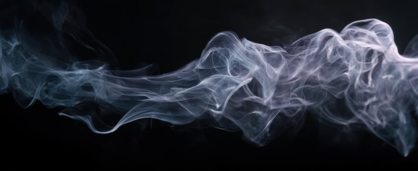 The delicate beauty of swirling smoke against a dark backdrop. photo