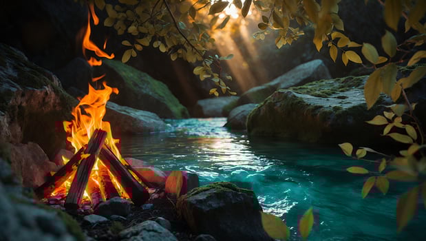 Campfire by River Stream with Sunlight Through Trees photo
