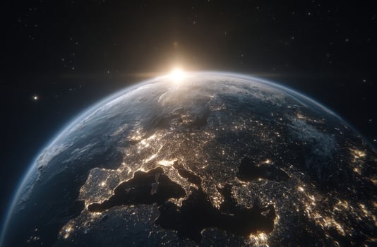 The earth at night with the sun shining photo
