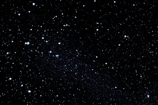 A large group of stars in the night sky photo