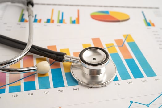 Stethoscope on spreadsheet and graph paper, Finance, Account, Statistics, Investment Analytic data photo