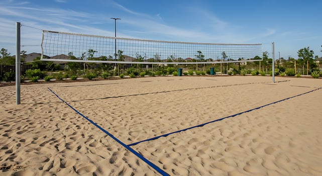 A volleyball court with a net in the sand photo