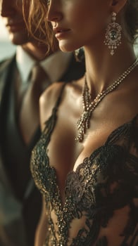 Elegant couple showcasing fashion in a sophisticated setting during a golden hour event photo