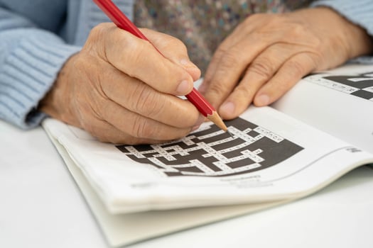 Bangkok, Thailand January 19, 2025 elderly woman playing puzzle game. photo