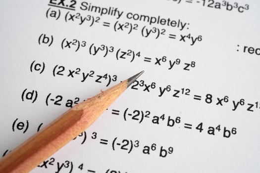 Pencil on mathematic formula exercise test paper photo