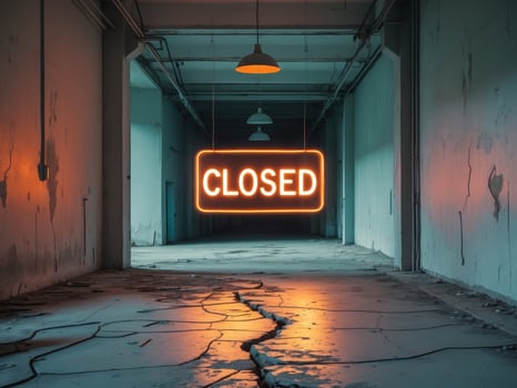 Abandoned Building Interior with Neon Closed Sign, Featuring Cracked Floor and Old Walls. photo