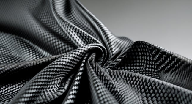A close up of a black fabric with a pattern photo