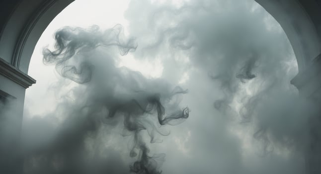 A smoke cloud is seen through an archway photo