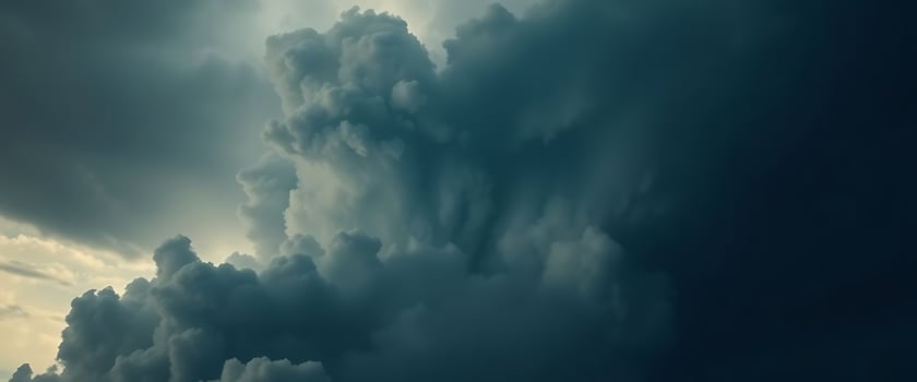 large cloud of dark clouds in the sky photo