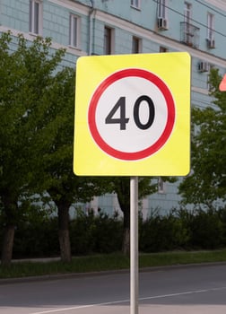 road sign - speed limit - on the road in the city photo