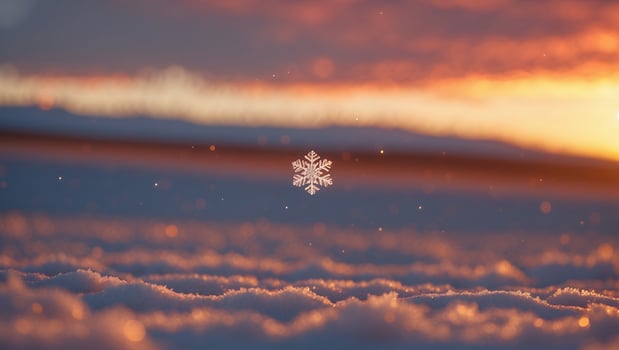 Snowflake Falling on Snowy Landscape with Sunset Sky Background photo