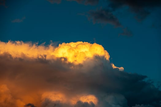 Multicolored sky with clouds and dramatic lighting Tropical sky photo