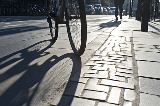 A bike parked on a sidewalk photo